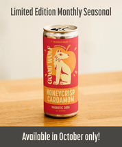 Probiotic soda can with 'Good Wolf' branding on a wooden surface, text indicating limited edition and seasonal availability.